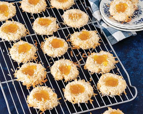 These piña colada-inspired goodies are a true delight. Pineapple-Coconut Thumbprint Cookies   Save Recipe Print Makes About 25 Ingredients 1 cup unsalted butter, softened ⅔ cup sugar 1 large egg, room temperature 1 teaspoon vanilla extract ¼ teaspoon coconut extract 2⅔ cups all-purpose flour ¾ teaspoon kosher salt ¼ teaspoon baking powder 1¾ cups sweetened … Pineapple Cookies, Coconut Snowballs, Coconut Extract, Pineapple Desserts, Coconut Dream, Snowball Cookies, Pineapple Coconut, Thumbprint Cookies, Xmas Cookies