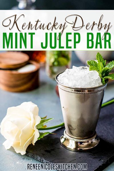 Mint juleps are delicious and fun to drink at parties – especially Kentucky Derby parties! This year create a mint julep cocktail bar featuring easy mint juleps with mint simple syrup. Stock your bar with all the essentials for easy to make mint juleps and let your guests serve themselves. Dust off your Derby hat, whip up a Derby Pie, and pour yourself a Mint Julep. It’s Derby Time! | Renee Nicole's Kitchen @reneenicoleskitchen #mintjulep #cocktailrecipes #authenticmintjulep #reneenicoleskitchen