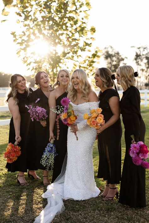 Bridal Bouquet Different From Bridesmaids, Bridesmaid One Flower Bouquet, Mix And Match Bridesmaid Bouquets, Black Bridesmaid Dresses Bright Florals, One Type Of Flower Bouquet, Black Bridesmaid Dresses With Colourful Flowers, Mixed Bridesmaid Bouquets, Black Bridesmaid Colorful Flowers, Monochrome Bridesmaid Bouquet