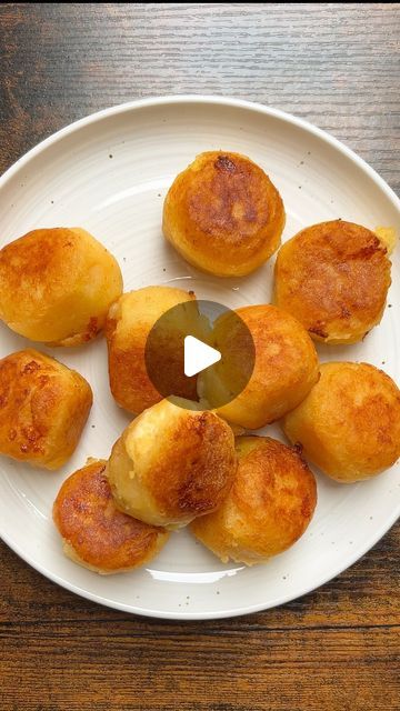 tastyuk on Instagram: "Ep 12: All Things Cheese 🧀 and today I’m sharing these 10/10 cheese stuffed potato balls😮‍💨
📌 RECIPE BELOW - Makes between 16-18 potato balls
Gather
750g white potatoes, peeled and chopped
3 tbsp cornflour
1 tsp smokey paprika
Salt to taste
150g grated mozzarella
100ml corn oil, for cooking

Method
1.) Boil the chopped potatoes along with a bit of salt until they’ve fully softened. Drain and place in a bowl.
2.) Add the corn flour, seasonings, oil and mash until smooth.
3.) Take a tbsp of the mash, flatten in the palm of your hands and make a hole in the middle to place a pinch of grated mozzarella. Carefully mould to form a potato ball, ensuring to cover the cheese with potato mash. Repeat this process with the rest of the mash and cheese. Make sure that the pot Potato Recipes With Cheese, Cheese Stuffed Potato Balls, Potato Mozzarella, Stuffed Mashed Potato Balls, Potato Ball, Potato Balls Recipe, Potato Cheese Balls, Mashed Potato Balls, Stuffed Potato