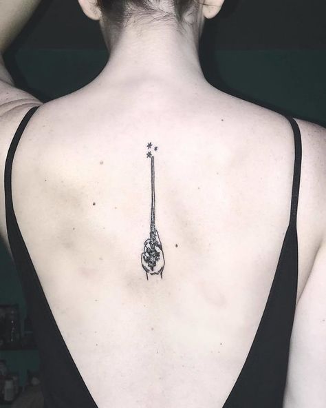 20+ Of The Best Spine Tattoo Ideas Ever Wand Spine Tattoo, Slytherin Tattoo, Girl Spine Tattoos, Valley Tattoo, Cream Tattoo, Flower Spine Tattoos, Wand Tattoo, Hp Tattoo, Spine Tattoos For Women