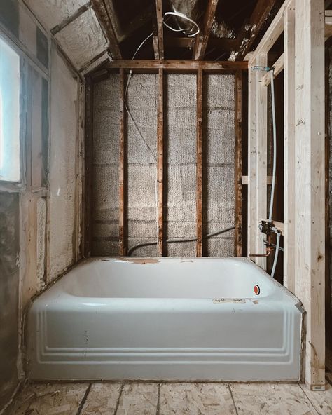 We have two nearly 100 year old homes to put back together. A common item we often see during the framing process are the original cast iron bathtubs. In many cases we hope to preserve and build around it, hard to find (and carry) new versions of these to reinstall. Added benefit for these homeowners are all new electrical, insulation, plumbing (imagine what the inside of 100 year old pipes look like) and drywall. We often appreciate the finished product, but what happens at this stage may b... Old Tile New Life Bathroom, Dresser Vanity Bathroom Plumbing, Bathroom Rough In Plumbing, Bathroom Plumbing Rough In, Jkath Design, Toilet Rough In Plumbing, Basalt Tile, Reclaimed Wood Vanity, Wood Floor Bathroom