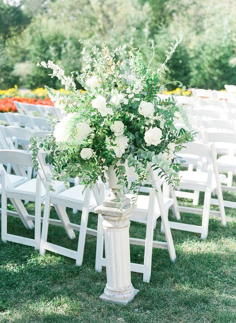 A Ryland Inn Wedding with Anoushka + Michael | Jessa's Journal | Venue: Ryland Inn, Coach House | Photographer: Jessa Schifilliti | Floral Design: Twisted Willow Flowers | Hair: Top Knots by Aimee | Makeup: Make Me Up Eva | Band: Hank Lane | Dress: Kleinfeld Bridal | Videographer: NST Pictures | Calligraphy on Invitations + Custom tote: PCB Home #weddinginspo #rylandinn #weddingday Flower Urns Wedding Ceremony, White Green Wedding Florals, Ceremony Pillars, Green And White Wedding Flowers, Ryland Inn Wedding, Ceremony Table, Outdoor Wedding Flowers, Urn Arrangements, White Wedding Ceremony