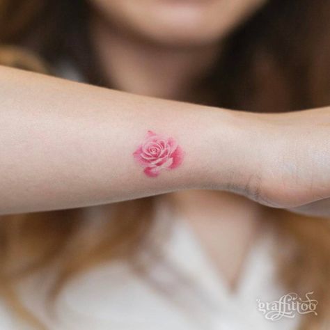 Pink rose tattoo on the right wrist. Pink Rose Tattoo, Pink Tattoo Ink, Pink Flower Tattoos, Rose Tat, Pink Rose Tattoos, Pink Tattoo, Small Rose Tattoo, Flower Wrist Tattoos, Cross Tattoos