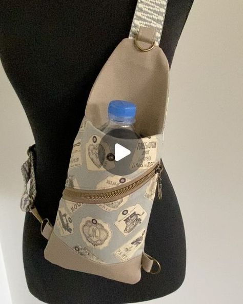 Katie Tedeschini on Instagram: "Can it fit a water bottle? Swipe to see!! The #minitravelerpouch  pattern by @kandoucrafts is such a clever pattern. I have 2 more in the works….. then I must focus!  #slingbag #bagmaker #sewistofinstagram" Bottle Sling Diy, Water Bottle Bag Diy, Water Bottle Bag Sewing Pattern, Bottle Bag Sewing Pattern, Small Bag Pattern, Diy Water Bottle, Bottle Sling, Holster Bag, Water Bottle Carrier