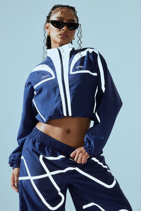 Available In Navy. Windbreaker FN Paris Verbiage Long Sleeve Front Zipper Closure 2 Zipper Pockets Reflective Trim Elastic Waistband Pair With: FN Paris Jogger Pant Self: 100% Nylon Lining: 100% Polyester Imported | FN Paris Windbreaker Jacket in Navy Blue size XS by Fashion Nova Tlc Fashion, Sweat Suits Women, High Waisted Pants Outfit, Navy Outfit, Womens Windbreaker, Zippered Cardigan, 90s Fashion Outfits, Sportswear Fashion, Running Fashion