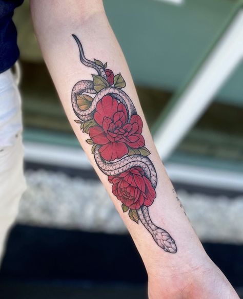 A classic snake and floral combo This tattoo will never go out of style. Loving the color pop of the florals! #tattoo #tattoostudio #blackandgreytattoo #colortattoo #floridatattoo #springbreak2023 #vacation #treatyoself #snaketattoo #femaletattooartist #tattoos Black Tattoo Pop Of Color, Florida Tattoos, Female Tattoo Artists, Treat Yoself, Black Tattoo, Snake Tattoo, Pop Of Color, Black And Grey Tattoos, Color Tattoo