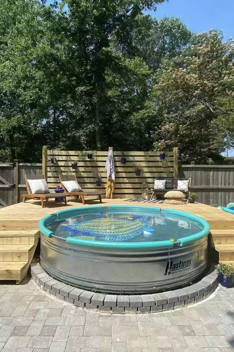 They're known as cowboy pools and trough pools and are seen everywhere! Stock tank pools are replacing more traditional in-ground swimming pools. Enjoy a look at 32 of our favorite stock tank pool designs—along with stock tank tips and how-tos—and get inspired. #StockTankPool #StockTankPoolBackyard #StockTankPoolIdeas #TheSpruce Pool Metal Tub, Small Metal Pools Backyard, Metal Tank Pool, Double Stock Tank Pool, Tractor Supply Stock Tank Pool, Cowboy Pool Deck Ideas, Cowboy Swimming Pool, Water Trough Pool With Deck, Cowboy Swimming Pools