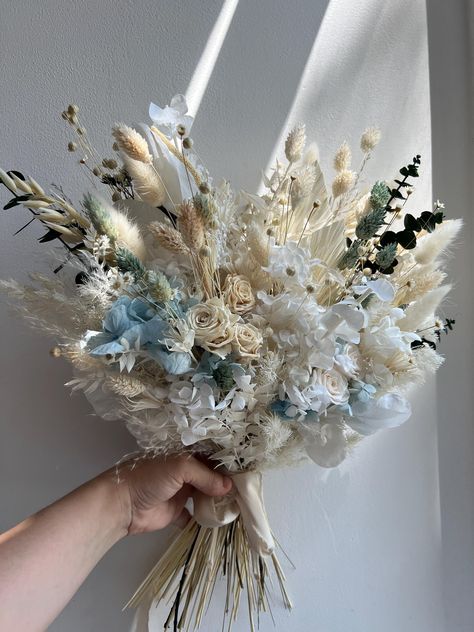 💐 Boho Wildflower Wedding Set 💐 Bring a touch of magic to your special day with this whimsical wildflower bouquet! Crafted with dried wildflowers, it's perfect for a dreamy wedding bouquet or as a charming bridesmaid bouquet. Add a matching fairy crown and pocket boutonniere for the ultimate boho look. Thoughtful as a bridesmaid gift or part of your wedding accessories, these floral arrangements bring rustic beauty to any wedding arrangement. 🌿✨ ✨ Bridal bouquet consist:   Choose another our wedding bouquet in our store:  https://www.etsy.com/listing/1361401186/bridal-bouquet-wedding-flowers-dried "HANDCRAFTED ITEMS: 🎨 Please be aware that each handcrafted item is unique, and the final product may slightly vary from the pictures due to the handmade and natural characteristics of our pr Pink And Blue Wildflower Bouquet, Wedding Bouquets Wildflowers, Hoco Flowers Bouquet, Bluebonnet Bouquet, Wedding Bouquets Beach, Wildflower Bouquet Wedding, Dried Flower Wedding Bouquet, Boho Wildflower Wedding, Pocket Boutonniere