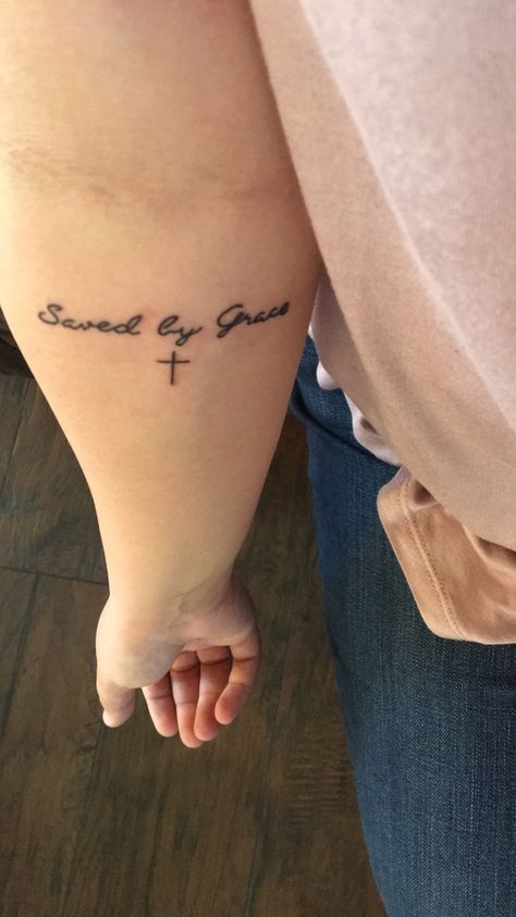 Saved by Grace💜✝️ Saved By His Grace Tattoo, Saved By Grace Tattoo With Cross, Saved By Grace Tattoos For Women, Jesus Saves Tattoo, Saved By Grace Tattoo, Grace Tattoo, Small Symbol Tattoos, Scripture Tattoos, Grace Tattoos