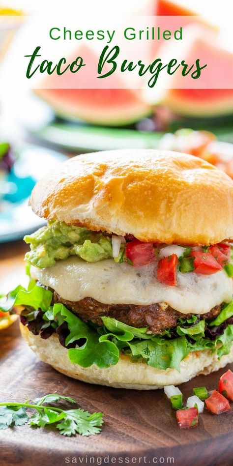 Cheesy Grilled Taco Burgers - all the Mexican flavors you love, in one tasty burger! This is not your same old dried-up burger; it's cheesy and juicy with plenty of flavor without being salty or too intense. #savingroomfordessert #burger #taco #tacotuesday #grilledburger #hamburger #mexicanburger #cheeseburger #tacoburger #mexican Taco Burgers, Mexican Burger, Taco Burger, Tasty Burger, Grilled Taco, Beef Burgers, Delicious Burgers, Barbecue Recipes, Beef Dishes