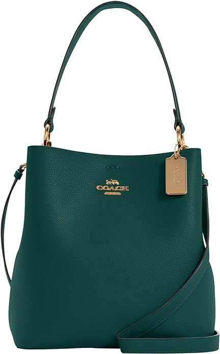 Our spacious polished pebble leather Town bucket bag is an essential style featuring a snap closure, internal zip pocket & long strap for versatile wear Double-Faced Leather: Get a feel for it. Our double-faced leather has two distinctively finished sides - for a sophisticated & sleek Coach bag Style Three Ways: Carry this versatile bucket tote in hand by the top handles or attach the long crossbody strap to style to as a shoulder bag or crossbody bag Coach Town Bucket Bag, Coach Fashion, Bucket Purse, Bucket Tote, Polished Pebble, Women's Bags By Style, Great Gifts For Women, Backpack Storage, Unique Bags