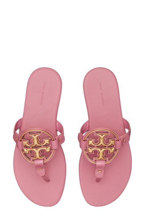 Known for its supple leather and iconic branding, this flip-flop takes it up a notch with a memory foam–cushioned footbed and metal logo hardware. Flat sole Memory foam cushioning Leather upper and lining/rubber sole Imported Pink Coach Sandals, Pink Tory Burch Sandals, Flat Dress Sandals, Hawaii Shoes, Designer Sandals Flat, Sandals Glitter, Soft Leather Sandals, Cute Flip Flops, Pretty Sneakers