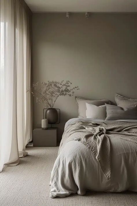 Are you tired of high-intensity hues and craving a more relaxed tone for your bedroom? Opting for a color palette combining beige and grey could be the solution you need. Here, we’ve curated 25 chic beige and grey bedroom ideas that exploit these tones' full potential, creating beautifully balanced interiors that exude tranquility and elegance. Bedroom Taupe Walls, Grey Bed Room Ideas, Calming Bedroom Colors Cozy, Cool Tone Bedroom, Grey Tone Bedroom, Grey Bed Bedroom Ideas, Bedroom Colors For 2024, Grey Beige Bedroom, Warm Grey Bedroom