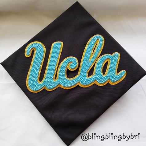 UCLA grad cap topper Grad Cap Ideas College Logo, Grad Cap College Logo, Ucla Grad Cap, Rhinestone Graduation Cap, Grad Cap Ideas, Graduation Board, College Photo, Grad Cap Topper, Prom 23