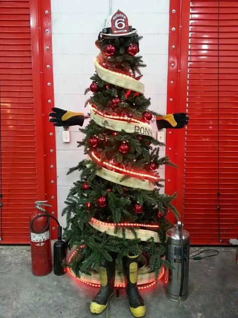 Fire tree.  Found my tree for this year.  I wonder if it would look good with my tinsel tree. Ems Christmas Tree, Firefighter Inspiration, Fire Department Christmas, Fire Department Decor, Firefighter Room, Firefighter Crafts, Firefighter Christmas, Firefighter Family, Firefighter Humor