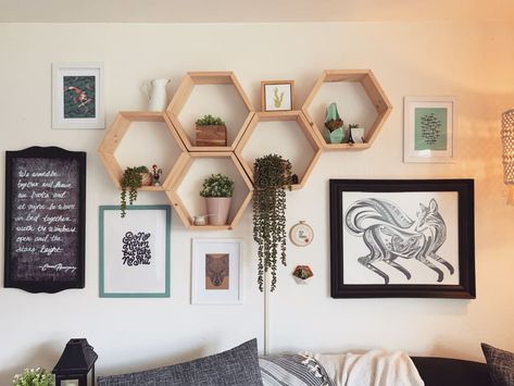 Hexagon Floating Shelves Living Room, Hexagon Shelves Dining Room, Gallery Wall With Hexagon Shelves, Wall Collage Shelves, Hexagon Shelf Decor Living Rooms, Hexagon Shelves Behind Couch, Honeycomb Shelves Living Room, Hexagon Wall Decor Ideas, Hexagon Shelves Decor Ideas