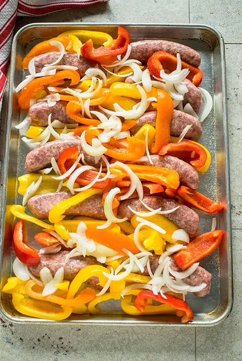 You can make Sausage, Peppers and Onions in the Oven in less than an hour! This is the best sausage and peppers recipe! #sausagepeppersandonions #sausageandpeppersinoven Oven Sausage And Peppers, Baked Sausage And Peppers, Italian Sausage In Oven, Baked Italian Sausage, Baked Sausage, Sheet Pan Sausage, Pan Sausage, Sausage Peppers And Onions, Sausage Recipes For Dinner