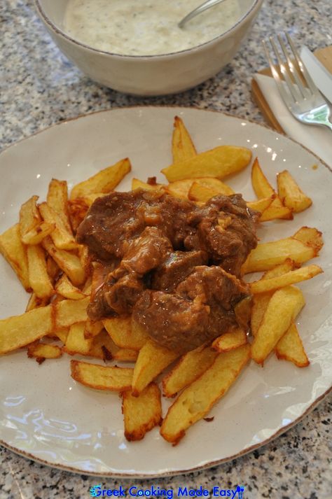 This is my Mom’s beloved recipe for the classic, Greek succulent Beef in a rich tomato sauce which is also a staple in my home. Check some tips that my Mom taught me in this recipe, to succeed 100%, like me! "Loukoumi"!
#beefstew #Kokkinisto #keto #κοκκινιστό #Eatgreek  #homemadefood #greece #greek #greekrecipes #delicious #homecooking #συνταγες #greekcookingmadeeasy #love #greekcuisine #ελλάδα #greekfood  #greekyoutuber #madebyme  #foodinspiration #foodforthought #likemygrandma #bestfoodworld Greek Beef Stew, Spinach Tart, Eat Greek, Spicy Cheese, Homemade French Fries, Beetroot Salad, How To Cook Beef, Greek Cooking, Comfort Dishes