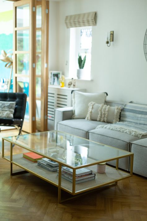 Aged golden coffee table by Annie Mo's, two tier rectangle coffee table. glass coffee table, large glass coffee table, rattan coffee table, brass coffee table, art display coffee table, midcentury style coffee table, antique coffee table, gold glass frame coffee table, coffee table styling, coffee table books, living room inspo, bohemian interior, boho decor, midentury decor, understated luxe Large Glass Coffee Table, Gold Coffee Table Living Room, Antique Glass Coffee Table, Gold Glass Living Room Table, Gold Glass Coffee Table Living Rooms, Brass And Glass Coffee Table Living Room, Books Living Room, Glass Gold Coffee Table Living Rooms, Bohemian Coffee Table