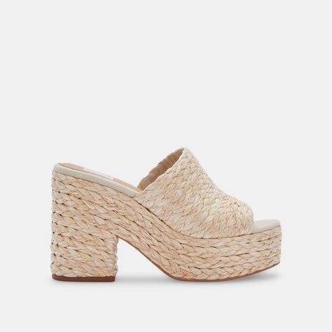 4" Heel Height, 2" Platform Height On our radar: raffia. This touchable texture is trending in a big way—so we've updated our ultimate chunky mule silhouette just in time for spring. Pair this throwback-inspired look with your favorite midi dress or wide-leg denim—whether you embrace her retro vibe or style her more modern, ELORA is sure to get noticed. Raffia Upper Synthetic Outsole Synthetic Lining Raffia-Covered Heel Mule Silhouette, Dolce Vita Heels, Pretty Heels, Chunky Wedges, Stylish Heels, Dolce Vita Shoes, Wide Leg Denim, Retro Vibe, Just In Time