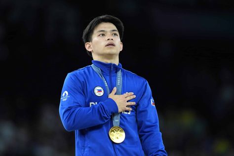 Carlos Yulo extends run of PH national anthem played at Olympics Carlos Yulo Gymnast, Philippine National Anthem, Floor Exercise, 2024 Summer Olympics, Paris Olympics, Pole Vault, Asian Games, Artistic Gymnastics, Sports Hero