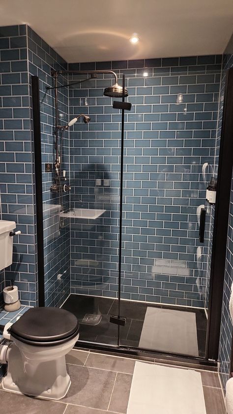 Blue Brick Tiles Bathroom, Blue Tile Bathroom Black Fixtures, Dark Blue Tile Bathroom, Clawfoot Tub Ideas, Organisation Inspiration, Metro Tiles Bathroom, Shower Floor Tile Ideas, Dark Blue Tile, Blue Shower Tile