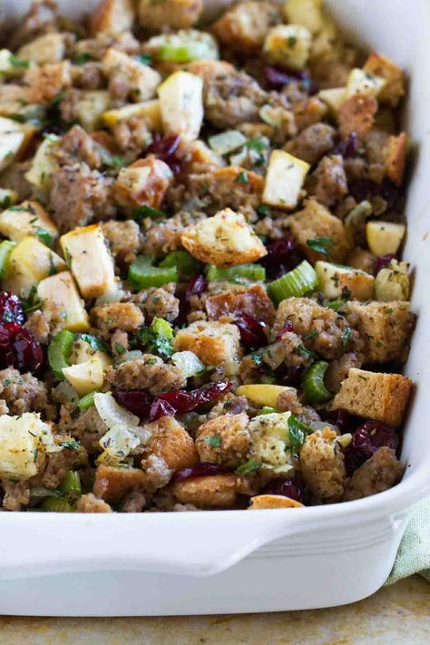 All of the flavors of fall come together in this Apple Cranberry and Sausage Dressing for the perfect holiday dressing recipe. Holiday Stuffing Recipes, Cranberry Stuffing, Sausage Stuffing Recipe, Fresh Herb Recipes, Gluten Free Stuffing, Stuffing Recipes For Thanksgiving, Sausage Stuffing, Herb Stuffing, Apple Sausage