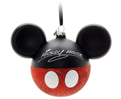 Even if you’re not having a winter wedding, these glittery Disney Store baubles will still look great as decorations throughout your venue. Why not attach them to chairs, put a few in glass vases for a unique centrepiece or swap bunting for a cute string of baubles? You can reuse them at Christmas too! Mickey Mouse Icon, Icon Christmas, Disney Christmas Ornaments, Disney Wedding Theme, Short Glass, Mouse Icon, Mouse Toy, Disney Ornaments, Globe Ornament