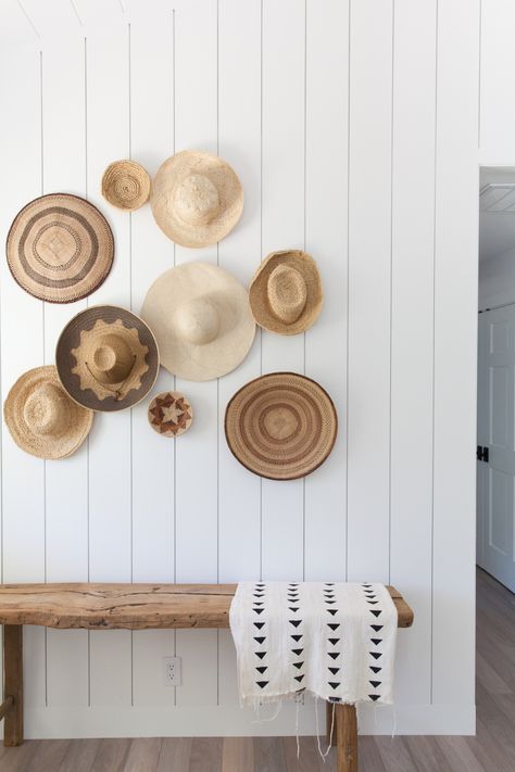 There’s a national day for just about everything and while we don’t typically acknowledge many of them, we had to give a little love to #NationalHatDay! Last week, we shared a stunning home tour with Mindy Gayer, which included this epic hat wall. Hat walls are such a fun way to incorporate fashion into your … Wall Hats, Hat Wall, Rustic Entryway, Hal Decor, Surf Shack, Entry Way Design, Vintage Hats, Wooden Bench, Ship Lap Walls