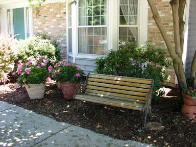 Bench in front yard. Bench In Front Yard Landscape, Flower Beds With Benches, Bench In Front Of House Landscaping, Bench In Landscaping Front Yard, Front Yard Landscaping With Bench, Front Yard Bench Ideas Seating Areas, Front Yard Seating Area Ideas No Porch, Outside Bench Ideas Front Yards, Bench In Front Yard