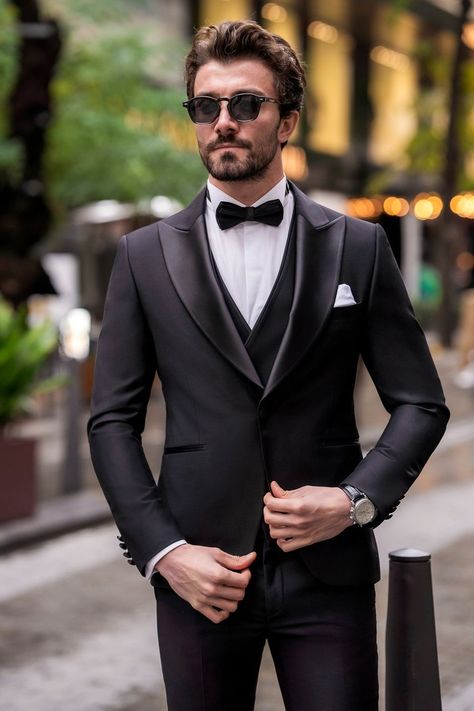 Discover sleek allure in our Black Slim-Fit Tuxedo 3-Piece. The elegant black hue and slim-fit design create a flawless, polished appearance that�’s perfect for formal events. Make every entrance memorable with this timeless and sophisticated ensemble.  #singlebreasted #blacktuxedo #tuxedo #suit #suits #slimfit #menstyle #menfashion #fashioninspo Best Wedding Suits, Bow Tie Suit, Modern Fit Suit, Suit Styles, Suit Stores, Slim Fit Suit Men, Slim Fit Tuxedo, Tuxedo Blazer, Suit Men