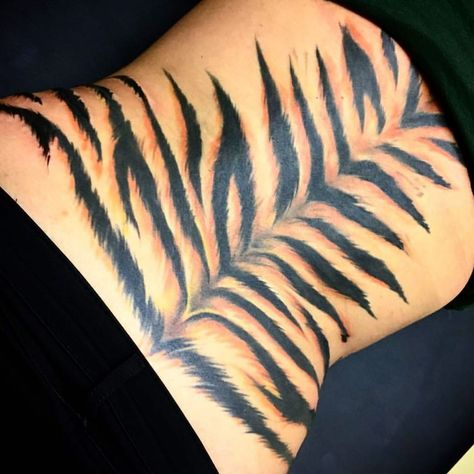 Tiger Stripes Tattoo, Tiger Stripe Tattoo, Stripe Tattoo, Ancient Tattoo, Tasteful Tattoos, Tiger Skin, Tattoo Meaning, Animal Print Fashion, Tiger Tattoo