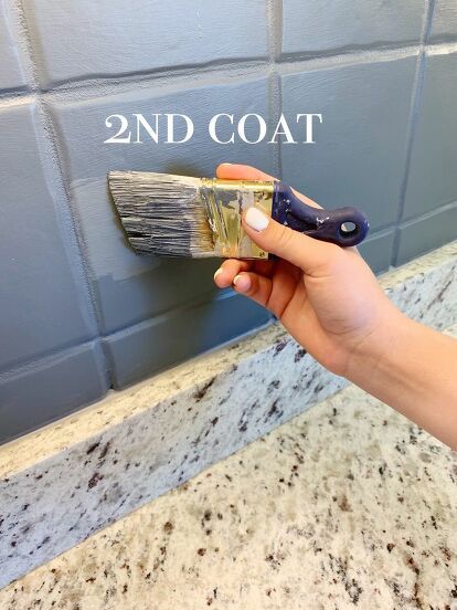 Wanting to update your kitchen without breaking the bank? This DIY project only requires a few supplies and can be done in an afternoon! Paint the outdated backsplash you currently have and save some major cash! Painting Peel And Stick Backsplash, Painted Tile Kitchen Backsplash, Paint Tile Backsplash Kitchen, Paint Backsplash Tile Before And After, Painting Kitchen Tile Backsplash, Painted Kitchen Backsplash Ideas, Diy Painted Backsplash, Paint Backsplash Tile, Painted Backsplash Ideas