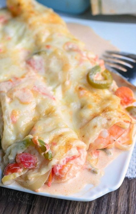 Spicy Creamy Shrimp Enchiladas on a white plate with a fork to the right Creamy Shrimp Enchiladas, Seafood Enchiladas Recipe, Smoked Seafood, Seafood Enchiladas, Shrimp Enchiladas, Best Shrimp Recipes, Authentic Mexican Recipes, Creamy Shrimp, Shrimp Recipes For Dinner