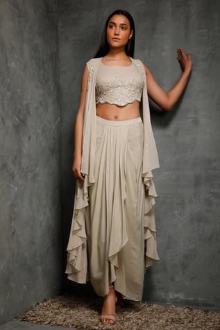 Shop for Seema Thukral Beige Embroidered Jacket And Skirt Set for Women Online at Aza Fashions Seema Thukral, Dhoti Skirt, Coord Sets, Skirt Draping, Heavy Dresses, Asymmetric Jacket, Fashion Diva, Draped Skirt, Designer Party Wear Dresses