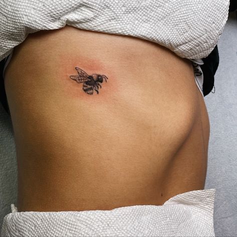 Tattoo Ideas Bumblebee, Bee Tattoo On Ribs, Bee Tattoo On Arm, Whimsical Bee Tattoo, Bee Tattoo Placement Ideas, Bee Rib Tattoo, Two Bees Tattoo, Butterfly Bee Tattoo, Bee And Butterfly Tattoo