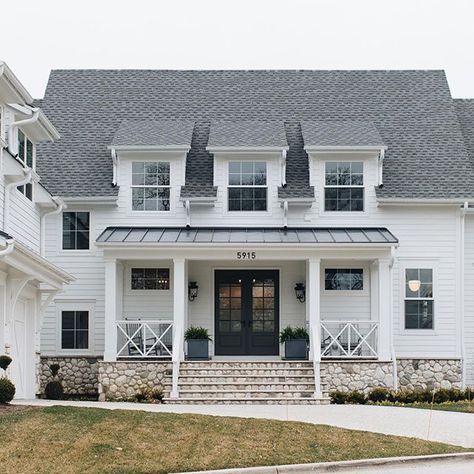 Modern white farmhouse with stone foundation White Exterior Windows, Modern Farmhouse Porch, Exterior Windows, Front Porch Railings, Craftsman Style Bungalow, Modern Porch, James Hardie, Lap Siding, White Exterior