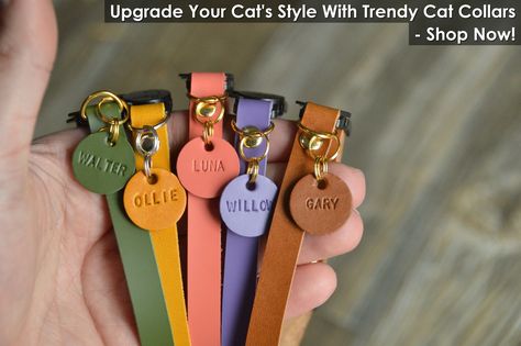 Elevate your cat's look with our trendy cat collars! From chic designs to durable materials, find the perfect accessory for your feline friend. Shop now and give your cat the style upgrade they deserve. Explore our collection of cat collars today! Leather Cat Collar, Cat Collar Tag, Kitten Collar, Luxury Dog Collars, Kitten Collars, Custom Dog Collars, Handmade Dog Collars, Personalized Dog Collars, Cat Tags