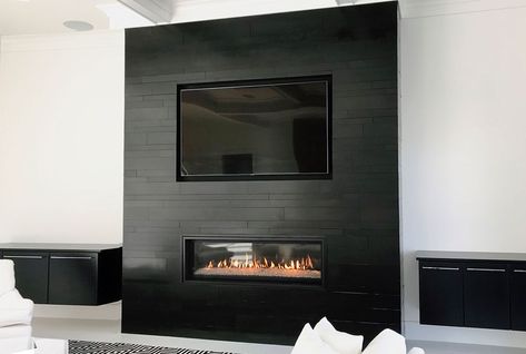 Ultra Modern Black Basalt Stone Fireplace with Norstone Building Stone PLANC Black Slate Tile Fireplace, Black Tile Wall Living Room, Black Fireplace Floor To Ceiling, Black Stone For Fireplace, Black Tile Fireplace Surround Modern, Black Tile Accent Wall Living Room, Black Floor To Ceiling Fireplace, Modern Black Fireplace Ideas, Black Stucco Fireplace