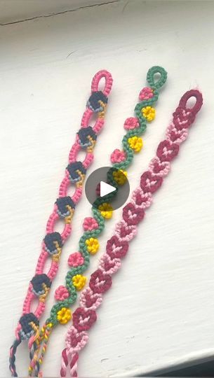 434K views · 950 reactions | ❓Which tutorial 🎥 do you want to see first? 😊 ⬇️ ••A quick 💨 reel with a poll for the first time … here are my recent “pink” bracelets using my original patterns and all the pattern numbers are the ones on @braceletbook .•Among these 3, Flower Vine is the only one I haven’t finished filming so if that is everyone’s preferred one it will take a little time to upload it on the tutorial.I am also working on other new patterns- some chains, some charms, and possibly a key chain- and hope to share a sneak peak 👀 as soon as I get to start making them!•#アクセサリー作家 #flowers #youtube #easydiy #graduationhat #bracelet #bracelets #diybracelets #macrame #friendshipbracelet #embroidery #knot #手鐲 #heartdesign #pink #embroideryart #ミサンガ #wristbands #valentines #springvibes Heart Chain Bracelet Pattern, Embroidery Thread Bracelets Tutorial, Flower Friendship Bracelet Patterns, Embroidery Knot, Embroidery Thread Bracelets, Pink Bracelets, Bracelet Stuff, Braided Bracelet Diy, Yarn Bracelets