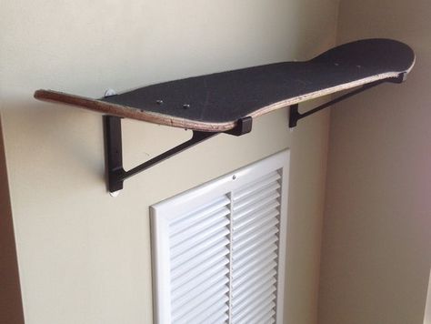 I designed some brackets to turn a worn out skateboard deck into a shelf. (Command strips did not work for me, had to install nail holes) Skateboard Shelf, Skateboard Shelves, Skateboard Room, Skateboard Furniture, Skateboard Decor, Skateboard Decks, My New Room, Apartment Living, New Room