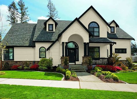 Exterior Trim Paint Color: Black Magic (PPG1001-7) by PPG | The Best Trim Colors for the Home Inside and Out Bungalow Makeover, Vintage Bungalow, Tan House, Gray House Exterior, Trim Paint, Roof Trim, Dark Trim, Dark Grey Walls, Trim Colors