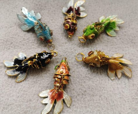 PRICES MAY VARY. Material:brass  Quantity:5pcs  Size :approx.35mm 45mm 55mm  color:mixed color(if want single color,please note it) Articulated Fish, Fish Beads, Nature Necklace, Earrings Pendant, Handmade Brass, Beaded Skull, Diy Charms, Crystal Gifts, Natural Beads