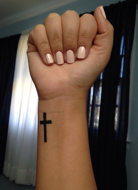 Cross wrist tattoo Cross With Heart Tattoo On Wrist, Cross Tattoos For Women On Wrist, Cross Wrist Tattoos For Women, Cross Wrist Tattoos, Cross And Heart Tattoo, Cross On Wrist Tattoo, Cross Tattoos On Wrist, Cross Tattoo Wrist, Small Catholic Tattoos