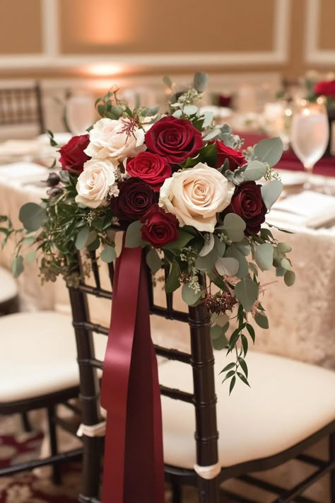 Elegant chair adorned with red and ivory roses. Unleash your inner florist with wild and whimsical floral wedding ideas that will make your special day bloom like never before. Red Wedding Decorations Elegant, Valentines Wedding Ideas, Red Summer Wedding, Whimsical Floral Wedding, Floral Wedding Ideas, Floral Wedding Decor, Red And White Wedding, Red Wedding Decorations, Red And White Weddings