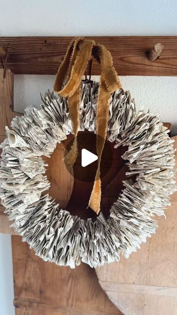 Christine on Instagram: "Welcome to our Makers DIY Challenge.  Today we are sharing our Wreath DIYs!

Let’s make a easy Hymnal Book Page Wreath! I used one hymnal I purchased at the thrift store for about $1 a wire round bottom piece to a lampshade I had been saving for something😂 ( for the life of me I don’t know why I saved it, but you can buy a wire round form at hobby lobby if you don’t have anything laying around) a stapler, a hole punch, ribbon of choice. 

I tore out all the pages and cut them in half. I used wire cutters and clipped the wreath form…aka, wire from lampshade bottom . Turned one side of cut piece to form a loop this will keep your pages from slipping off when you add them. Wad up each page and then unfold them. Fold in half and fold each end up kinda messy like imper Newspaper Wreath Diy, Book Wreath, Book Page Wreath, Wire Wreath Forms, Wreath Forms, Book Page, Diy Wreath, Hole Punch, Hobby Lobby