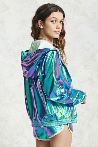 A holographic windbreaker jacket featuring a hood, long sleeves, partial mesh lining, a breathable mesh back panel, slant front pockets, elasticized cuffs and a zip closure. Holographic Jacket, Holographic Fashion, Metallic Jacket, Looks Party, Raincoats For Women, Pastel Goth, Look Cool, Windbreaker Jacket, Fashion Illustration