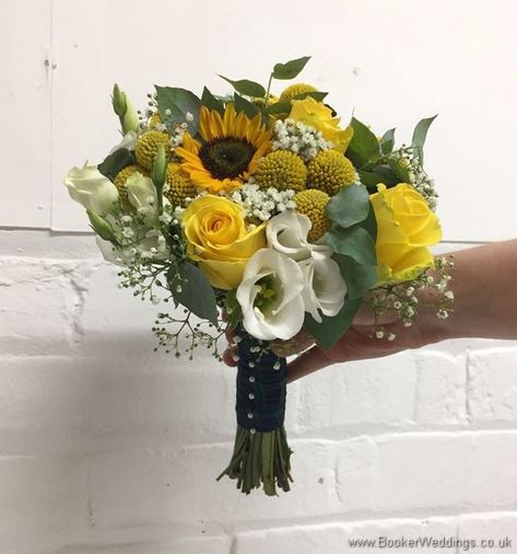 Bridal handtied bouquet in yellow and creams with yellow sunflowers, craspedia, roses, gypsy grass, lissanthus and grey eucalyptus #sunflowers #weddingflowers #bridebouquet #springwedding | Wedding Flowers Liverpool, Merseyside - Specialist Bridal Florist | Flower Delivery Liverpool - Same Day Delivery option | Florist Liverpool | Flower & Gift Shop Liverpool Wedding Bouquets Yellow And White, Yellow Rose Bridal Bouquet, Yellow Rose And Eucalyptus Bouquet, Yellow Rose Buttonhole, Bridal Bouquet Yellow, Sunflower Bridal Bouquet, Wedding Flowers Sunflowers, Pool Wedding, Flowers And Gifts