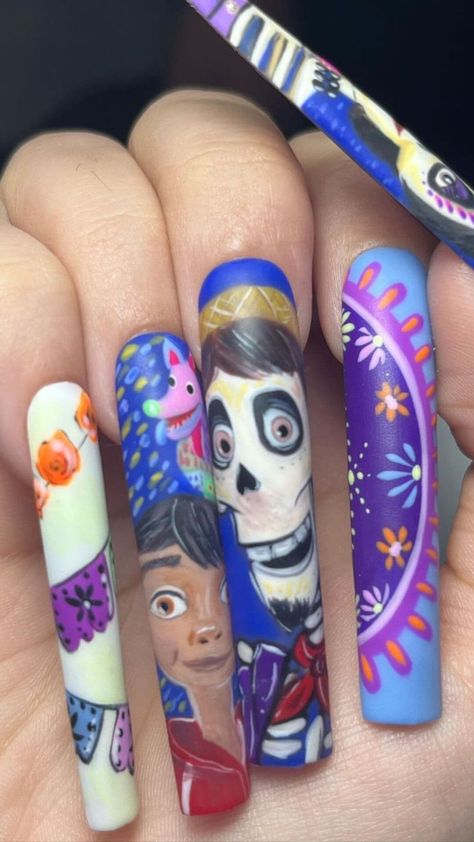 Embrace the Spirit: Coco-Inspired Day of the Dead Nail Art featuring vibrant colors and intricate su Disney Coco Nails, Day Of The Dead Nails, Dead Nails, Neon Purple Nails, Matte Purple Nails, Red Black Nails, Accent Nail Art, Skull Nail Art, Coco Nails